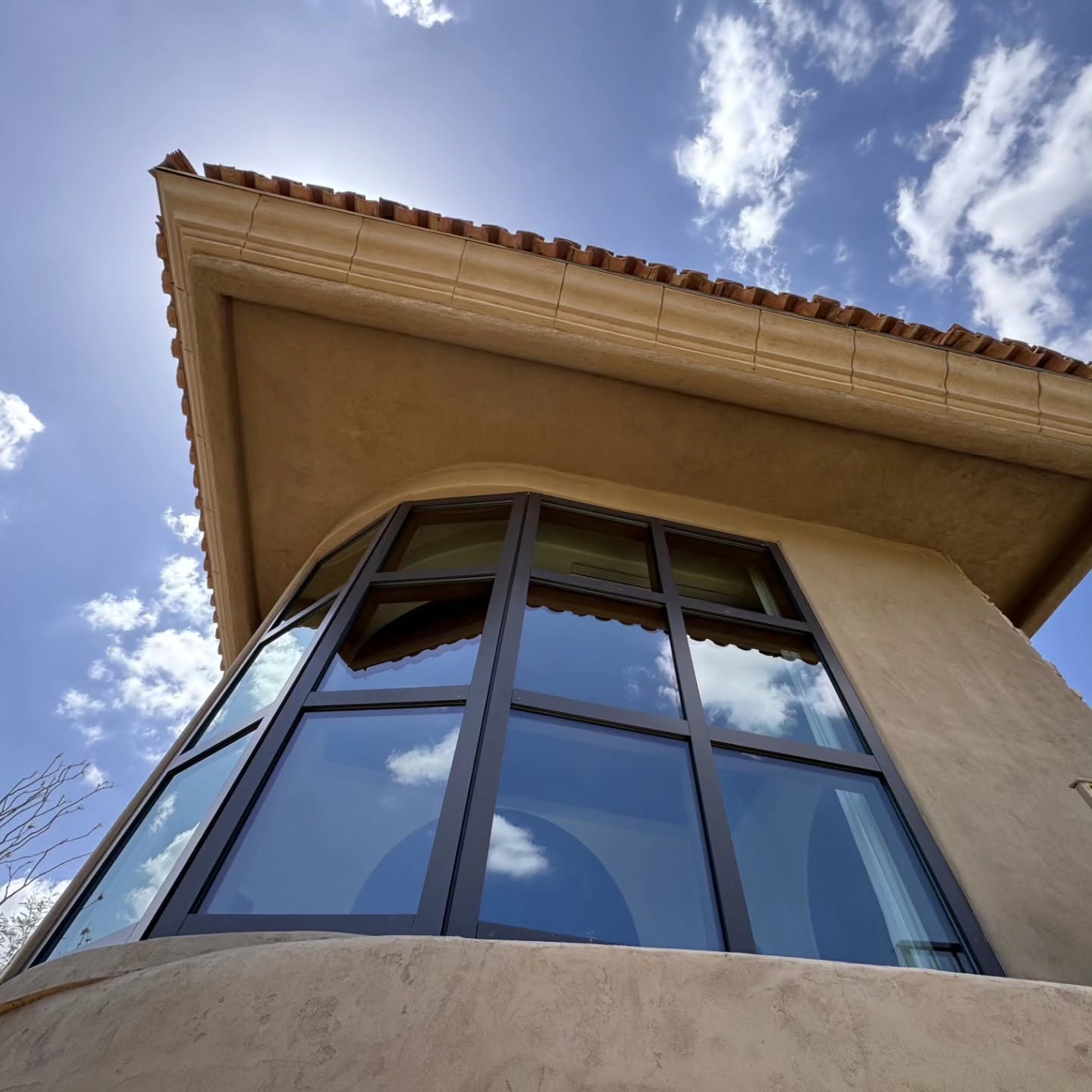 Clean windows reflecting sky